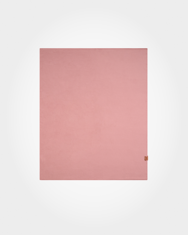 A solid dusty pink rectangular fabric item, likely a blanket, throw, or mat, shown flat against a light gray gradient background.
